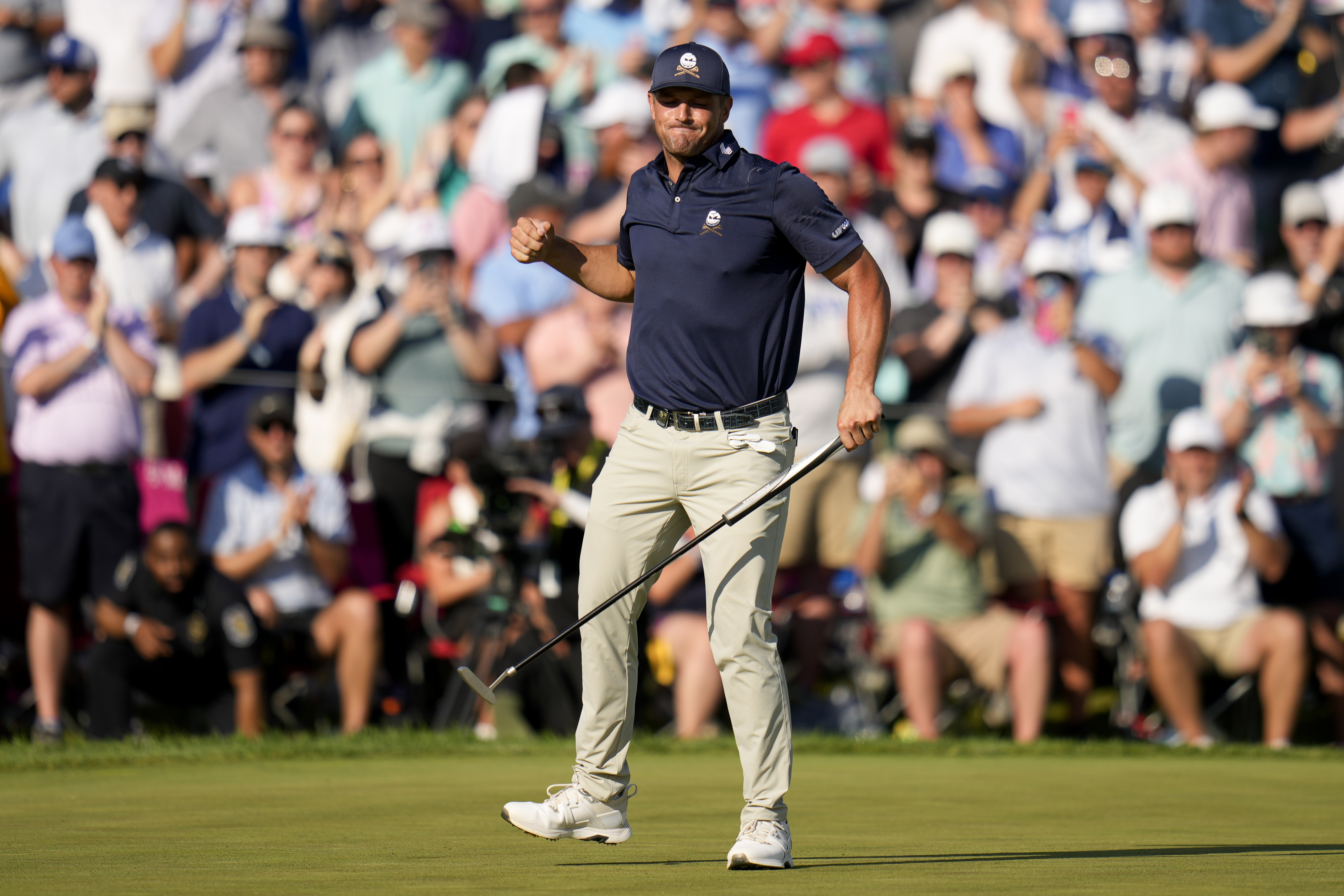 Bryson DeChambeau celebrates after a birdie on the 18th hole during the final round of the PGA Championship golf tournament at the Valhalla Golf Club.