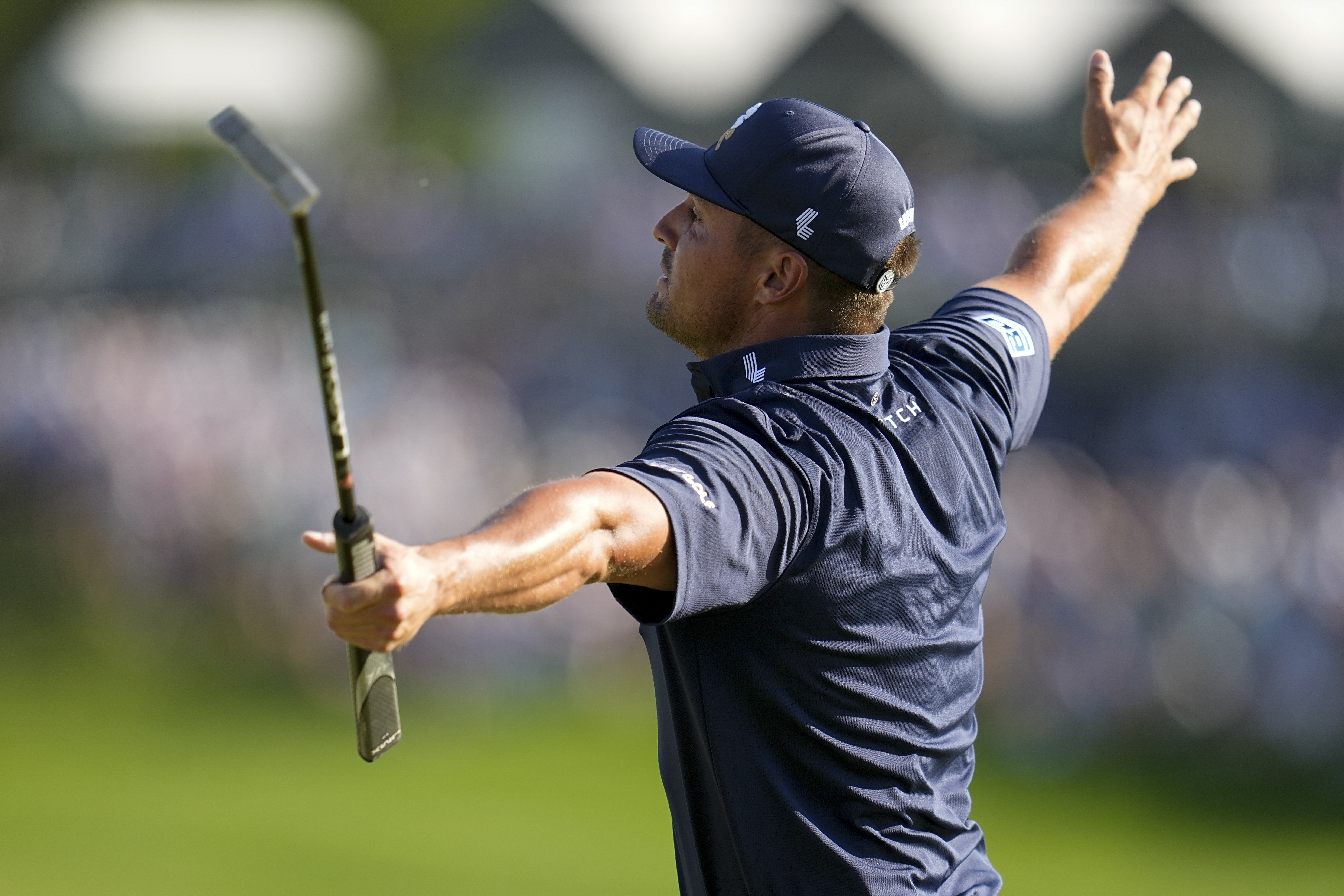 Bryson DeChambeau celebrates after a birdie on the 18th hole during the final round of the PGA Championship golf tournament at the Valhalla Golf Club.