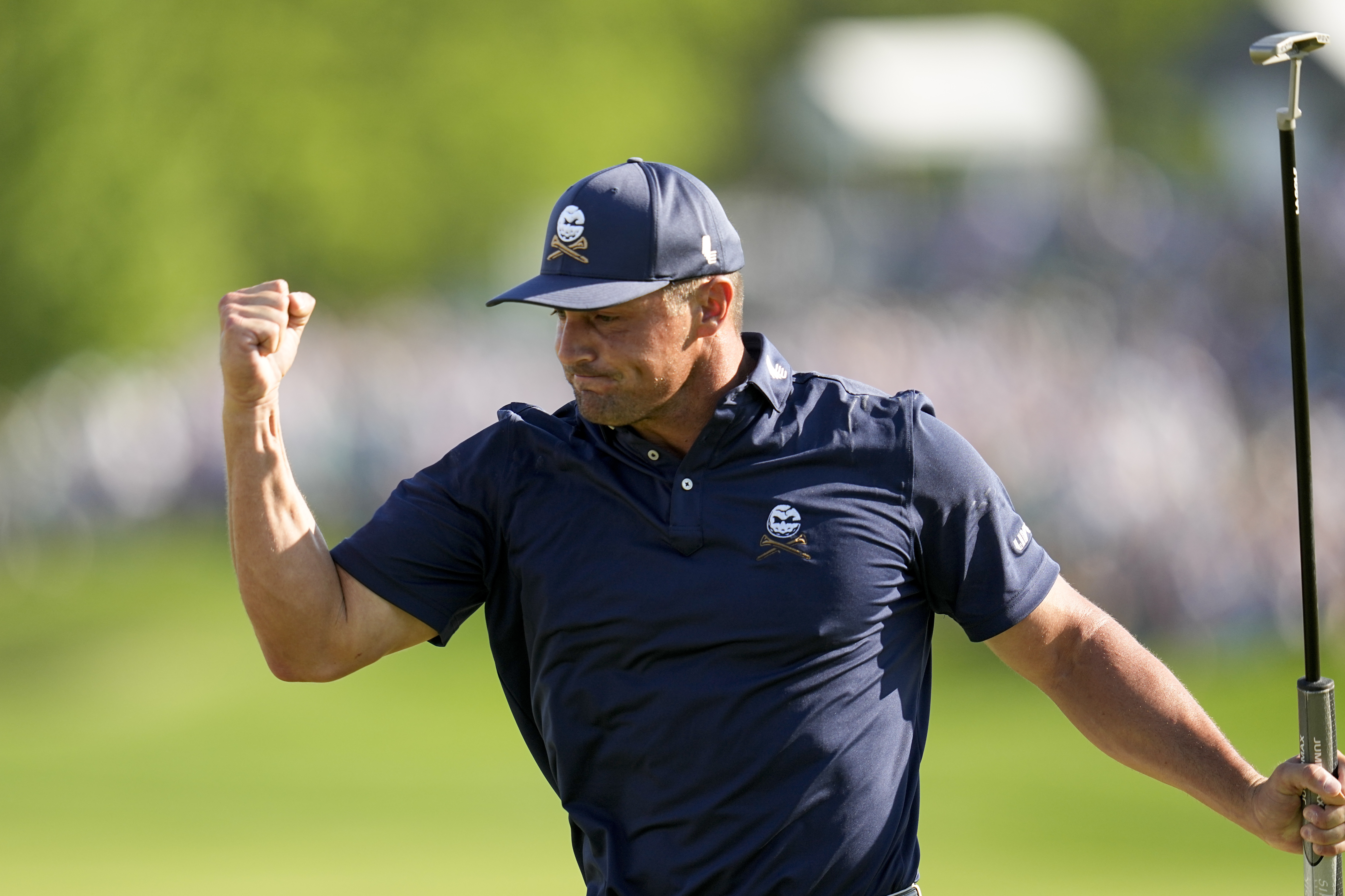 Bryson DeChambeau celebrates after a birdie on the 18th hole during the final round of the PGA Championship golf tournament at the Valhalla Golf Club.