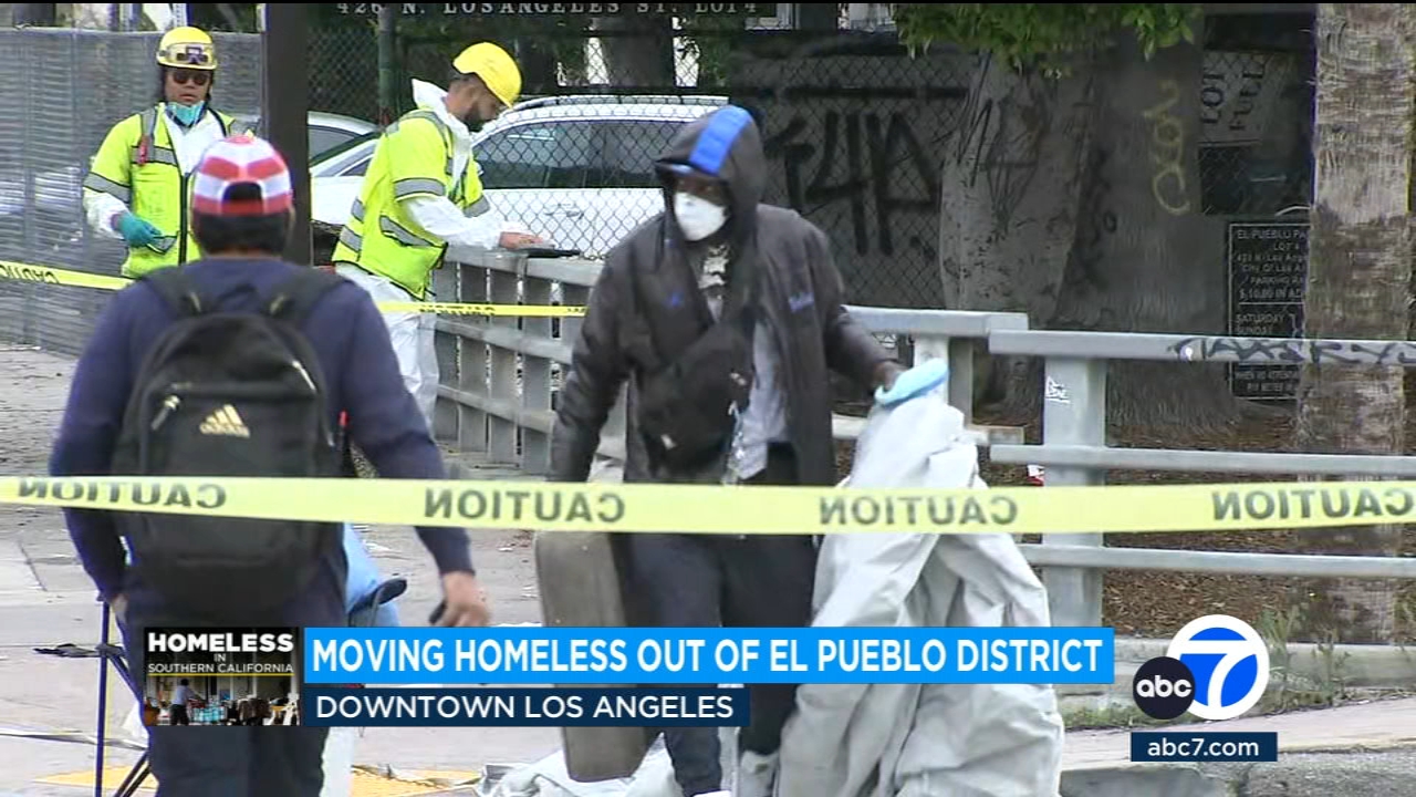 City crews work to remove homeless encampment in downtown LA