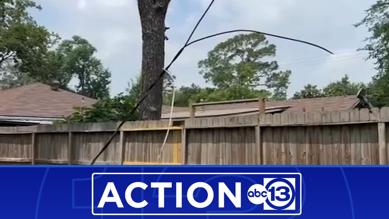 Active power lines left dangling in north Houston yards after storms