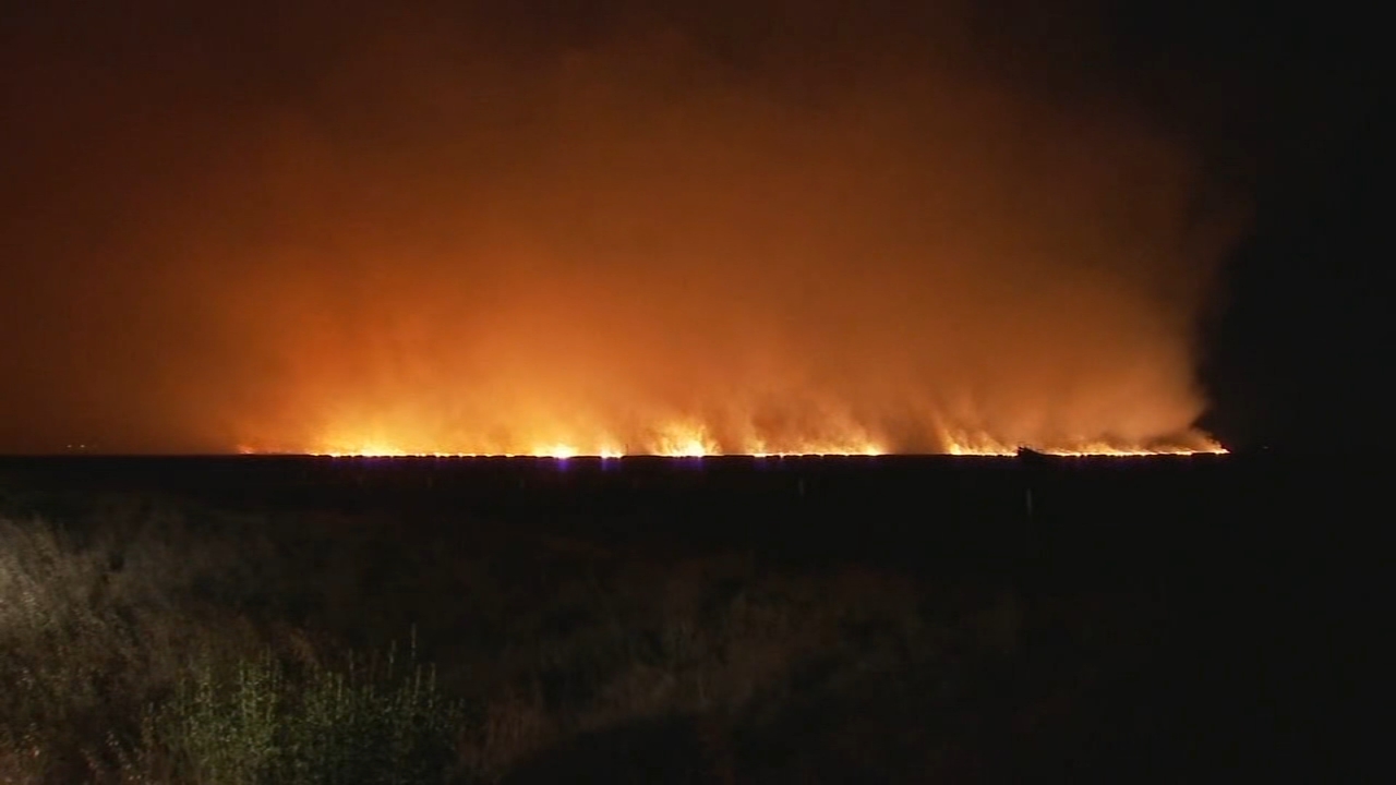 Crews contain wind-driven grass fire near Mendota