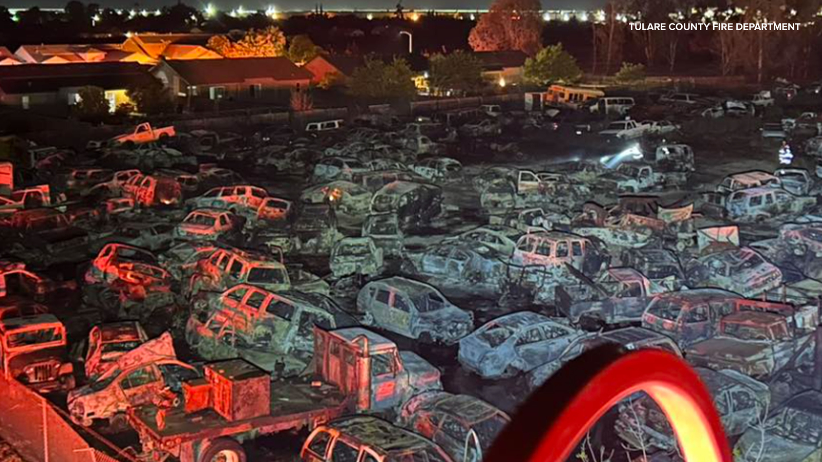 Grass fire spreads to auto-wrecking yard in Goshen, destroys at least 350 cars