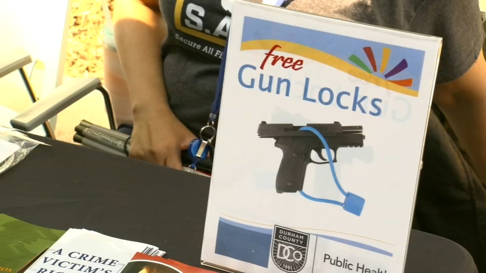 Durham County Department of Public Health give away free gun locks as a