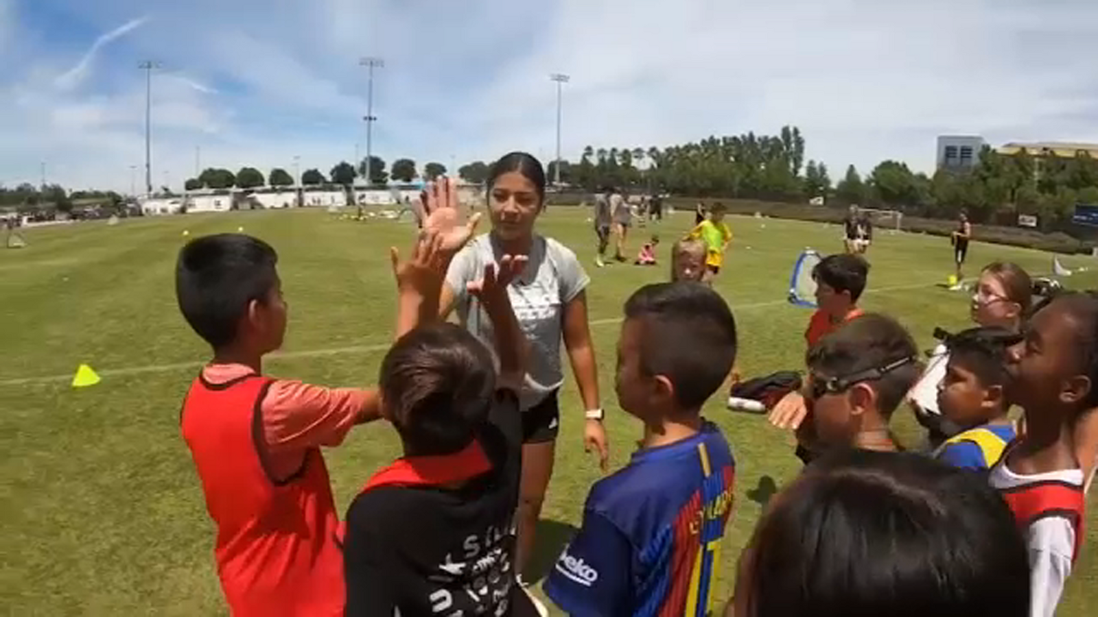 UC Merced coaches' young soccer players during summer camp