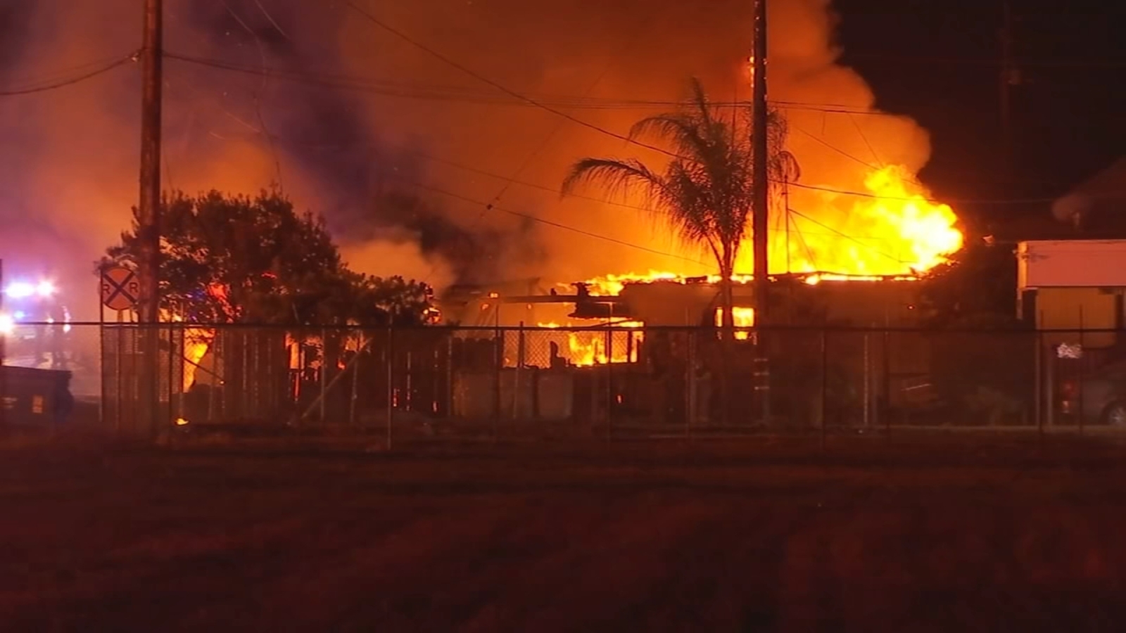Home destroyed after fire breaks out at pallet yard in Fresno County