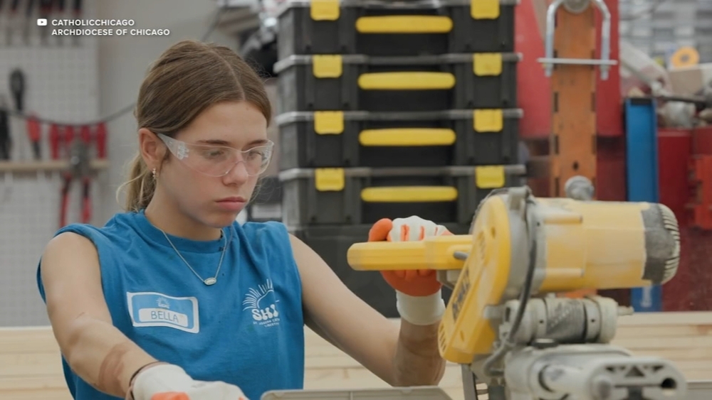 St. Joseph Catholic Parish students help make beds for children in need