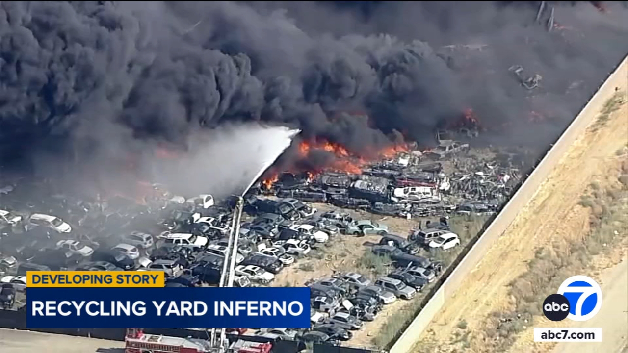 Hundreds of cars engulfed in flames at salvage yard in Lancaster