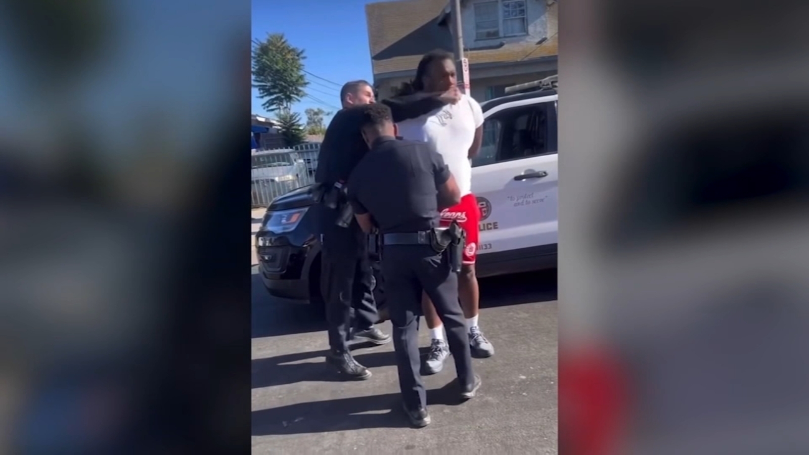 Investigation launched after video shows LAPD officer punch handcuffed man
