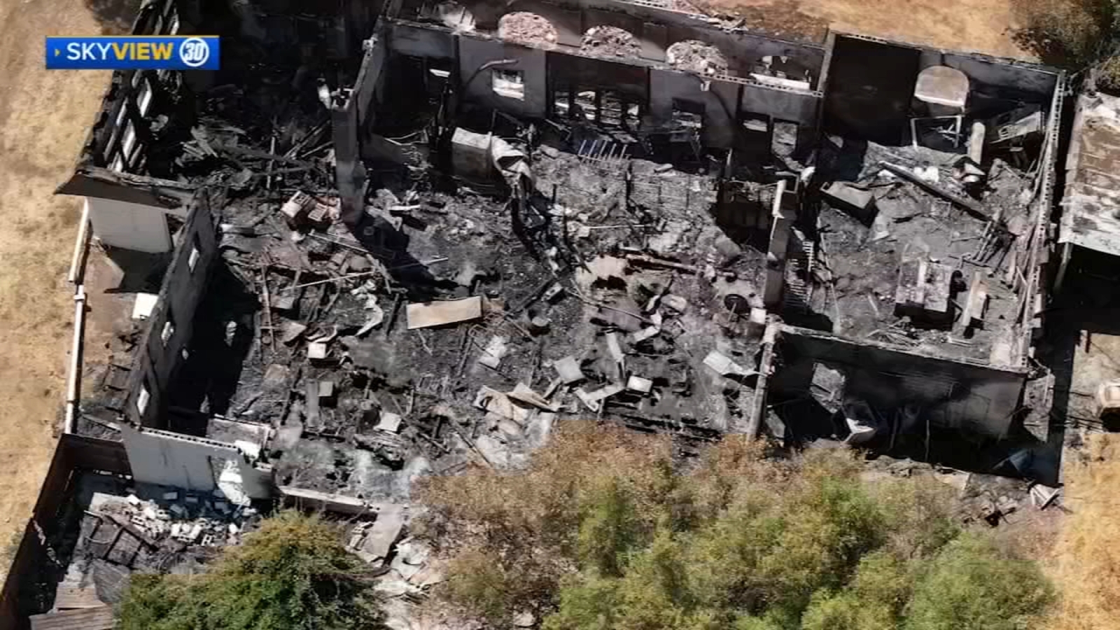 Fire destroys family business inside historic school house in Madera