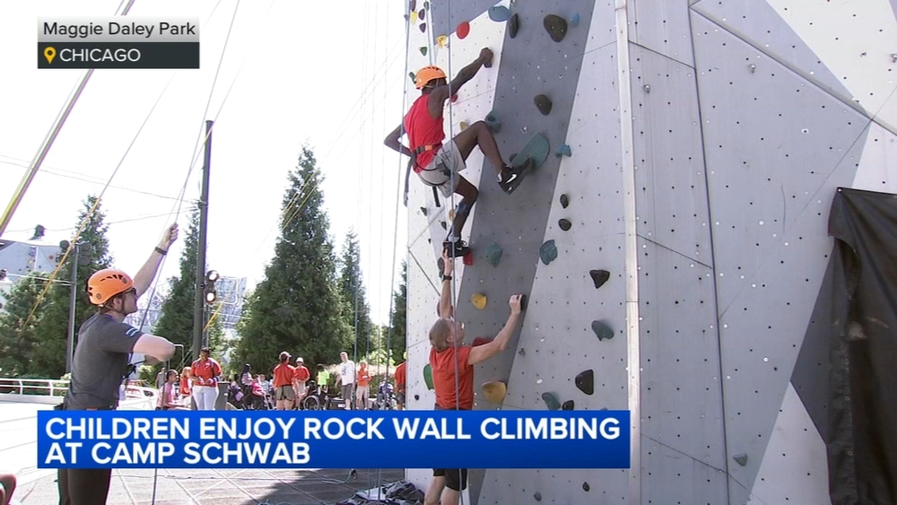 Children enjoy rock climbing at Camp Schwab