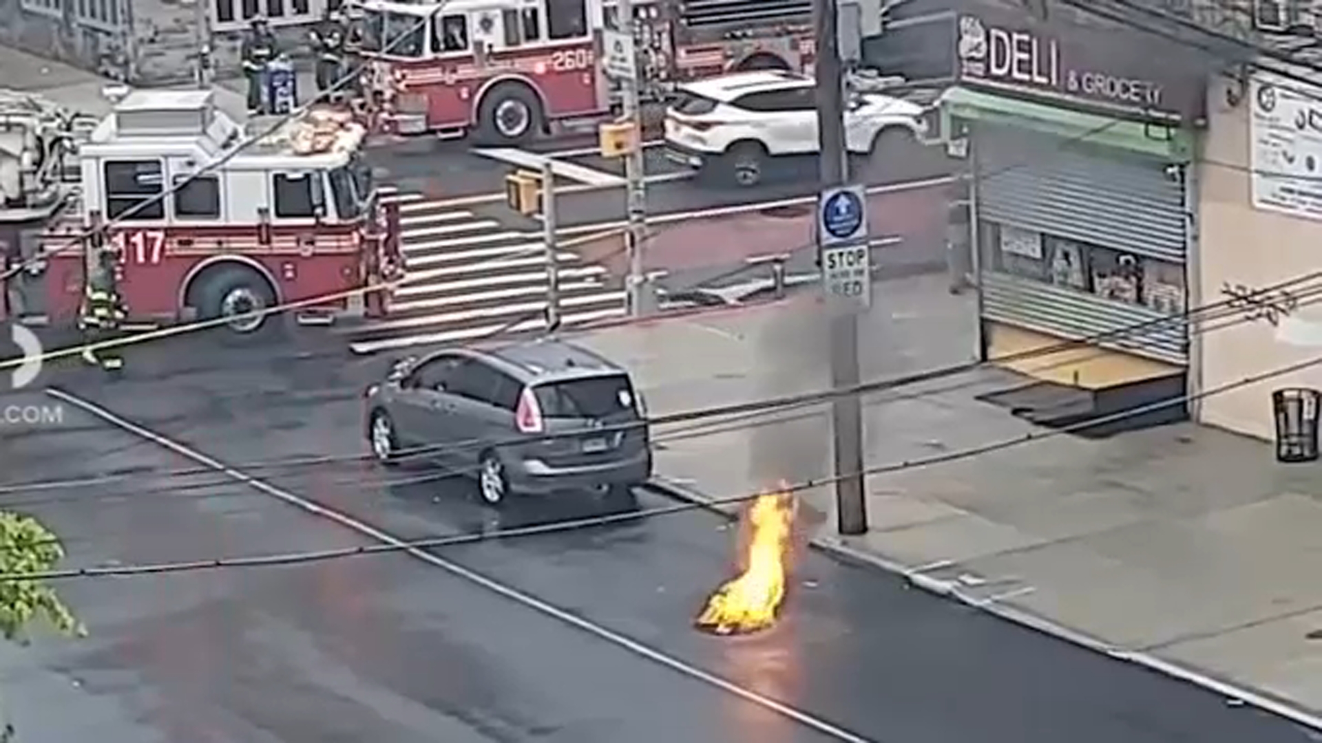 Manhole erupts into flames in Queens