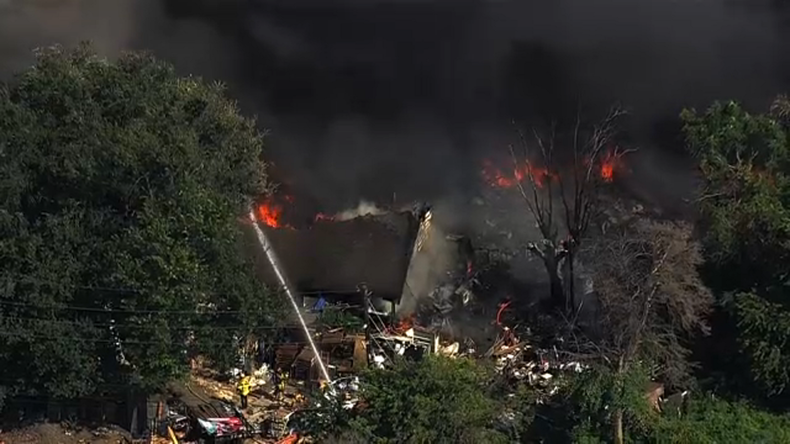 Multiple crews battling large fire on Keegans Ridge Road in southwest ...