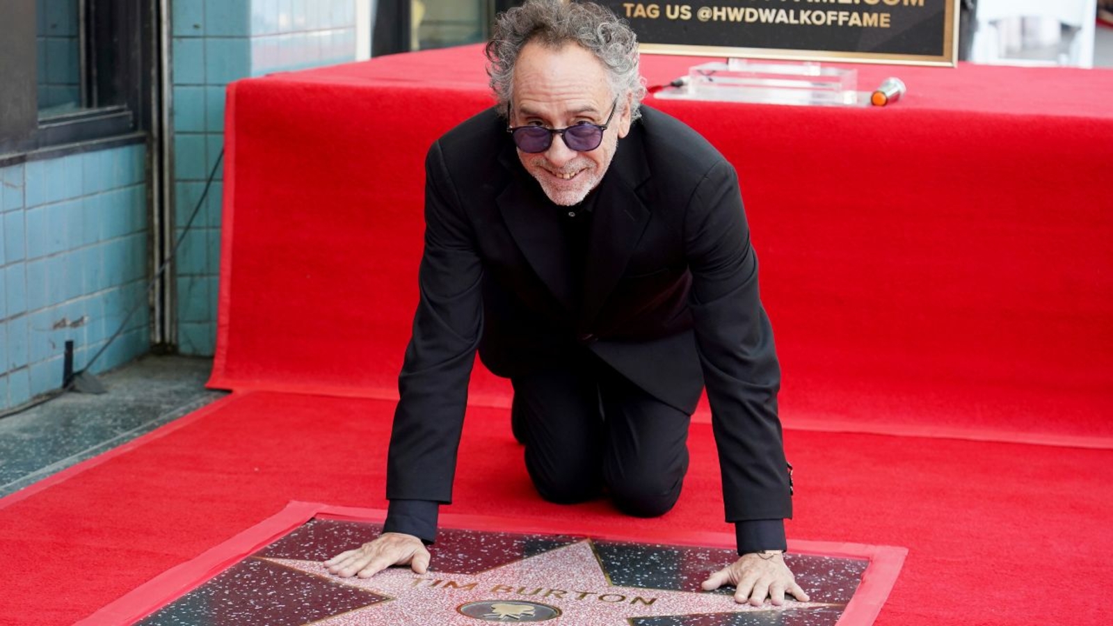 Legendary filmmaker Tim Burton receives star on Hollywood Walk of Fame