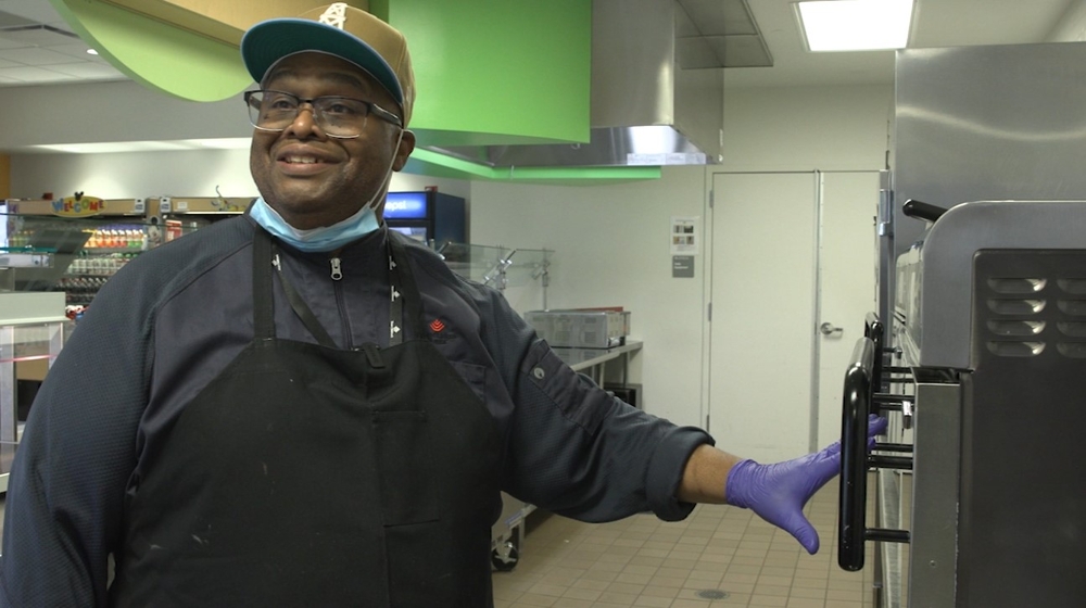 Chef serving smiles at children's hospital