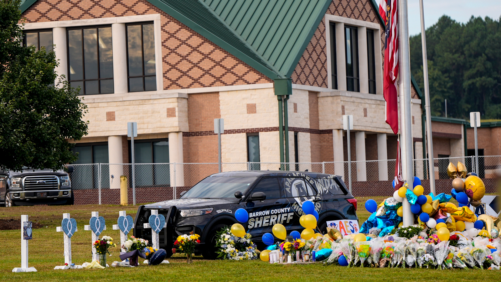 Mom of suspect in Georgia school shooting indicted and accused of taping parent to chair