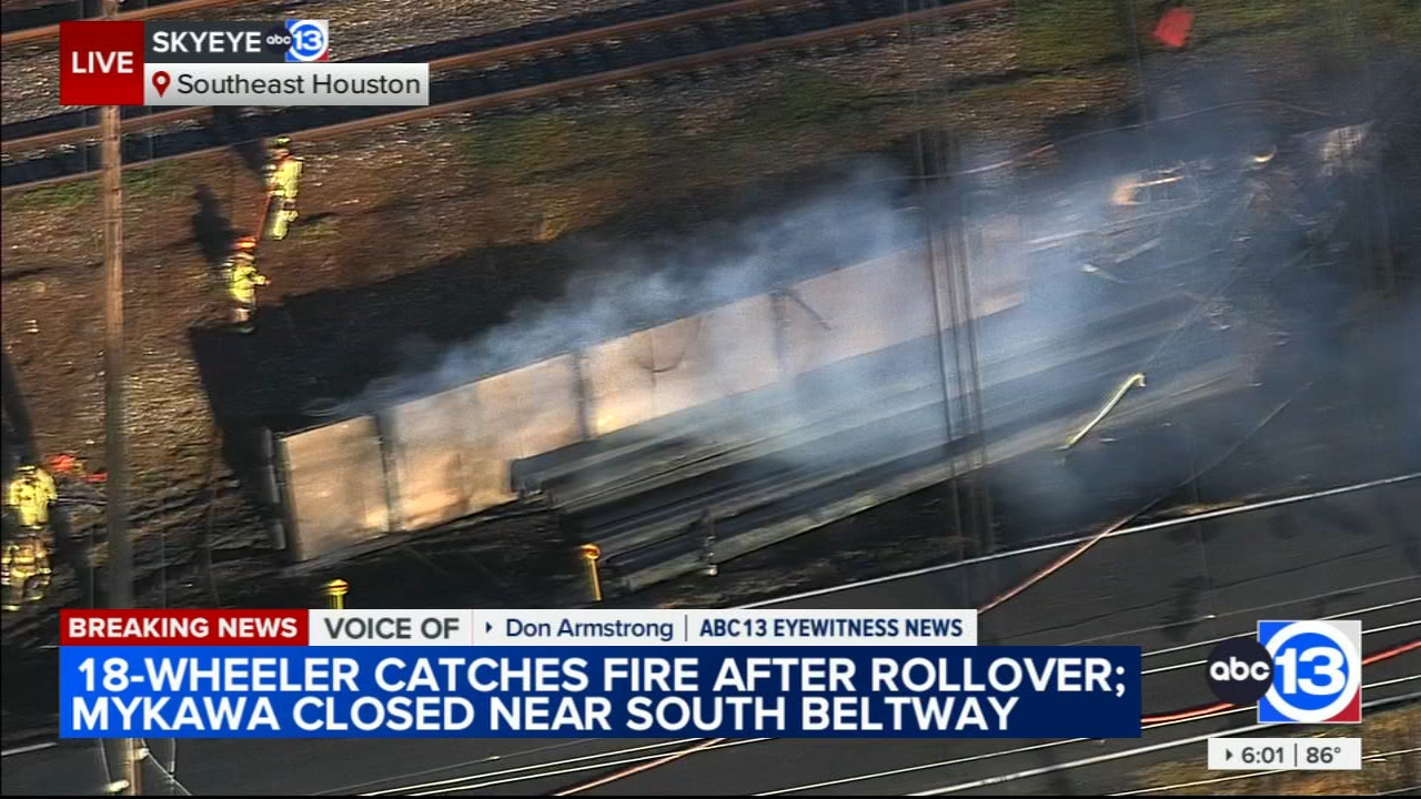 1 hurt after overturned 18-wheeler bursts into flames, HPD says