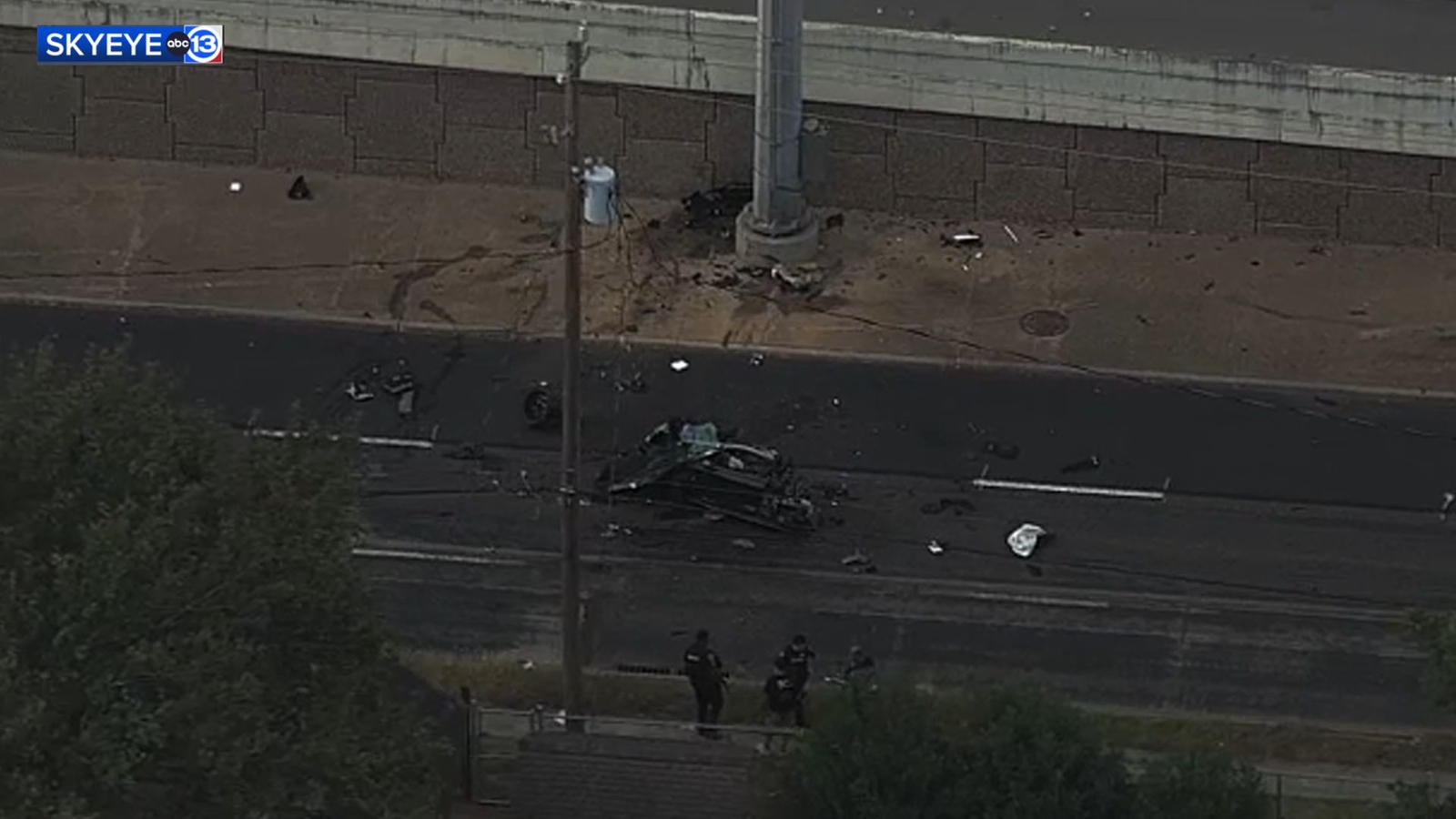 SW Freeway frontage lanes closed after major crash splits car in half
