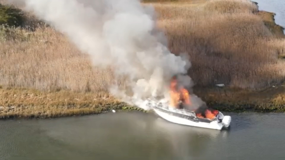 Emergency crews respond to boat on fire off the coast of Ocean County