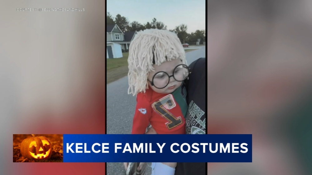 Baby dressed up as Donna Kelce in adorable Halloween costume
