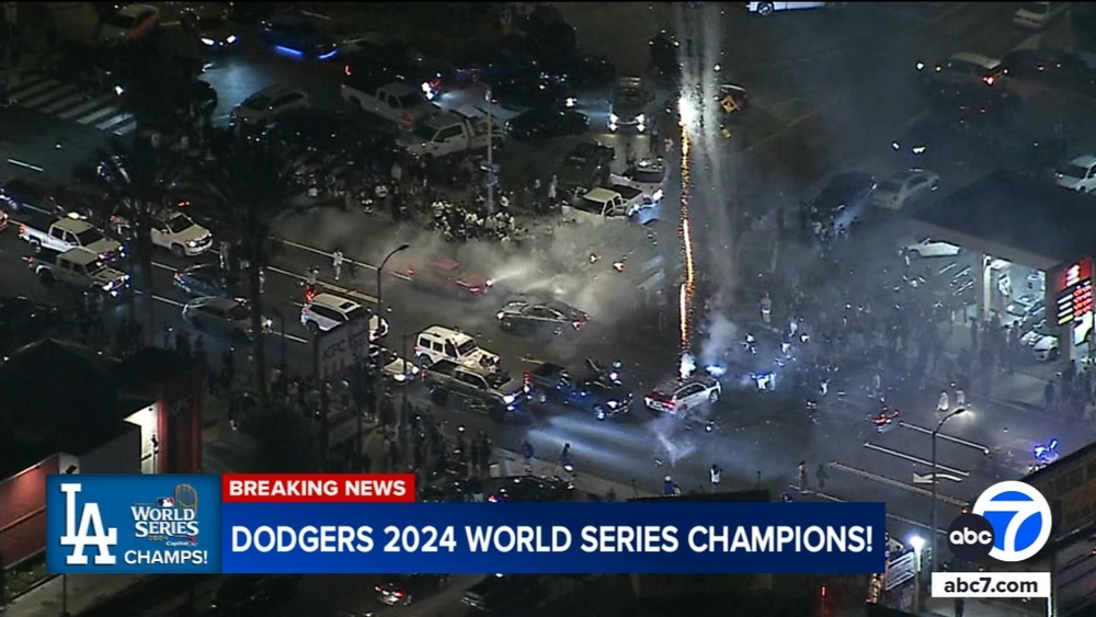 Fireworks, street takeovers pop up in East LA after Dodgers win title
