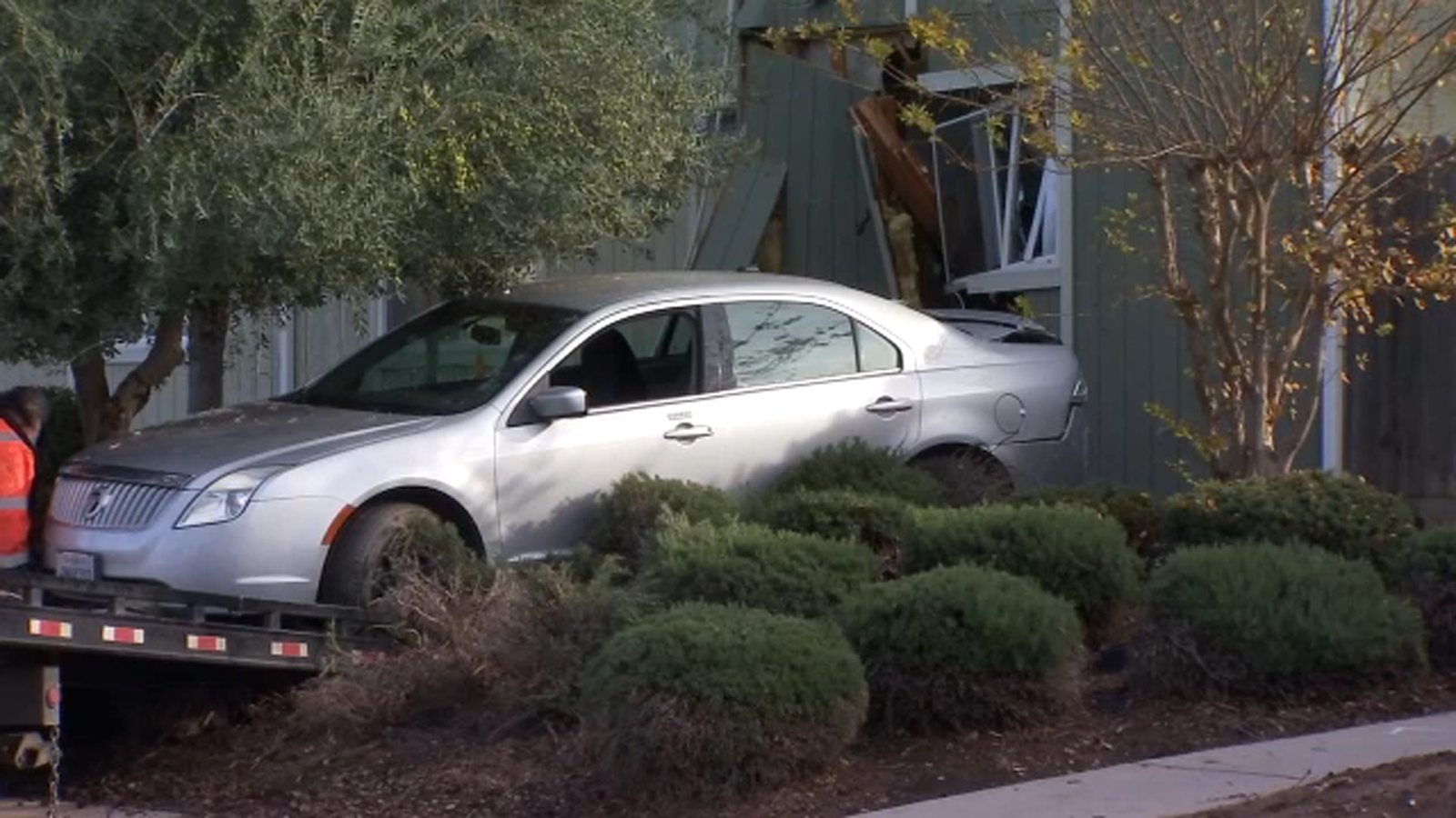 Woman arrested after crashing into apartment in Madera, police say