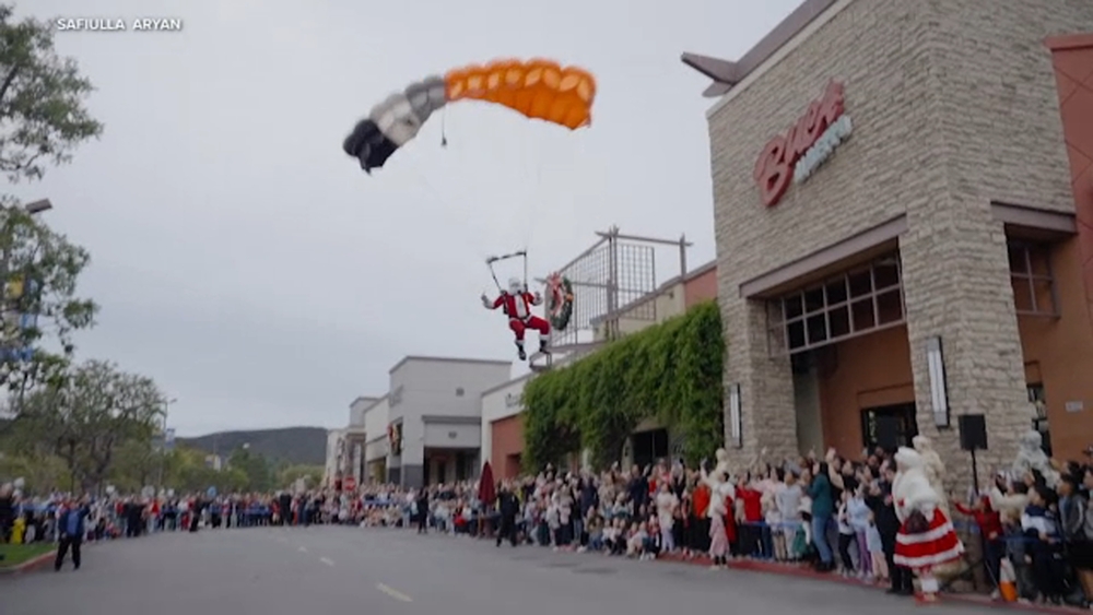 Santa Claus ditches sleigh, parachutes into town instead