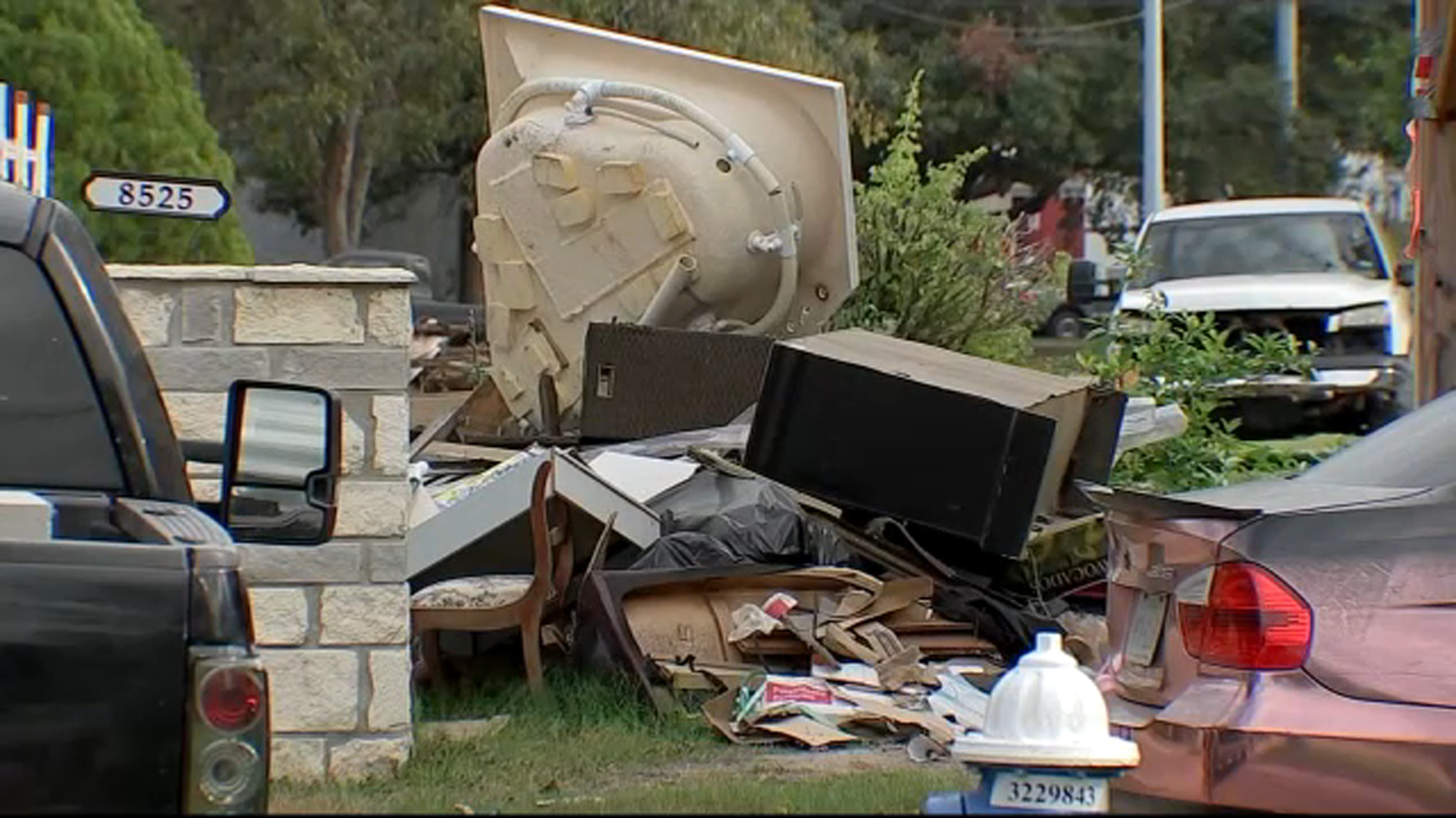 Friendship road residents demand action amid growing trash piles after city waste pickup delays