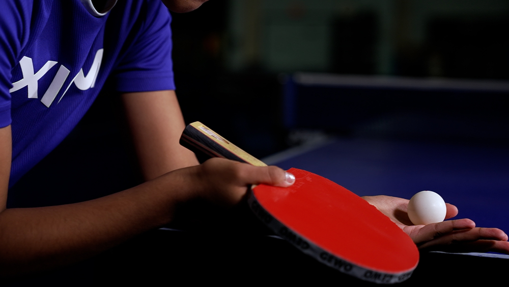 From puzzles to paddles: Crossword editor creates ping-pong oasis