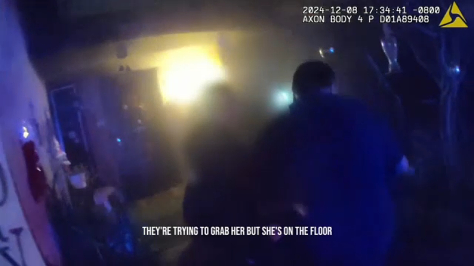 Bodycam footage captures officers, neighbors pull woman out of northwest Fresno house fire