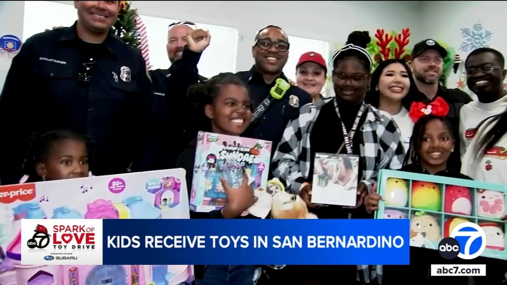 Firefighters distribute Spark of Love toys to kids in San Bernardino
