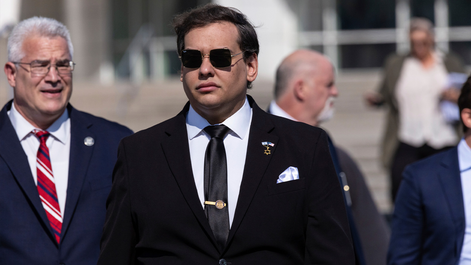 Ex-NY Representative George Santos seeks sentencing delay in federal fraud case.