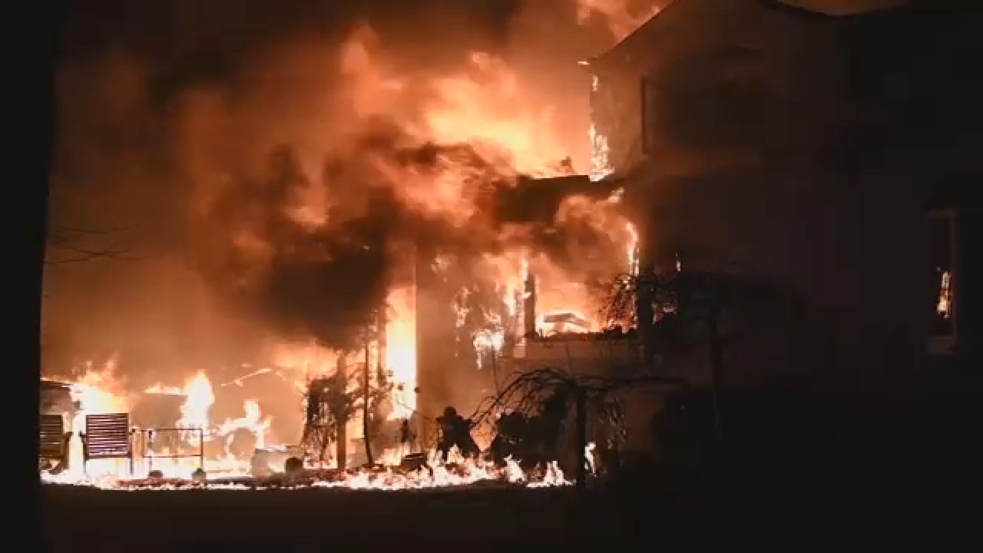 2 people jump from window in wind-fueled house fire