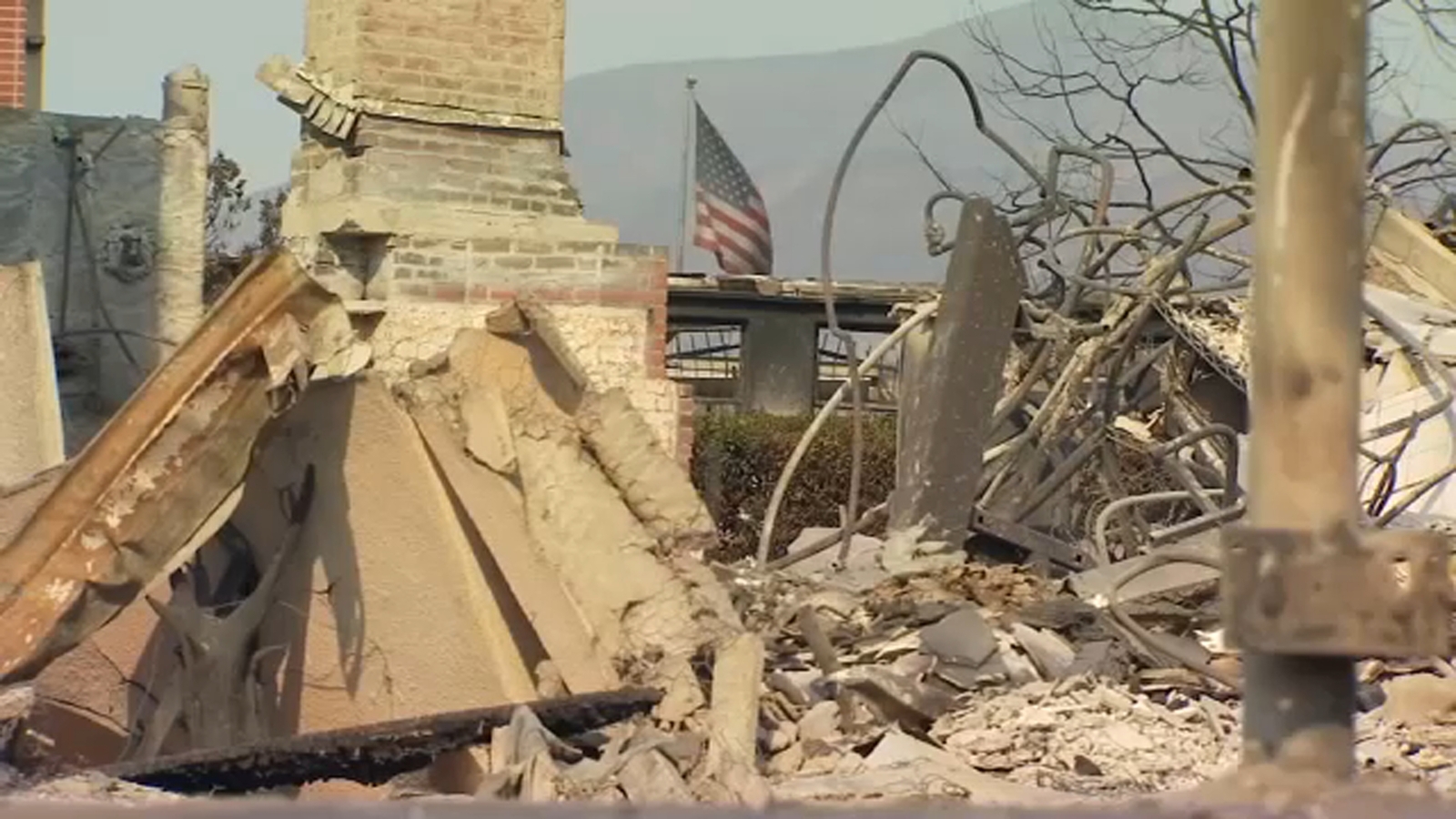 Death toll in Palisades fire rises as concerns of new flare up grow