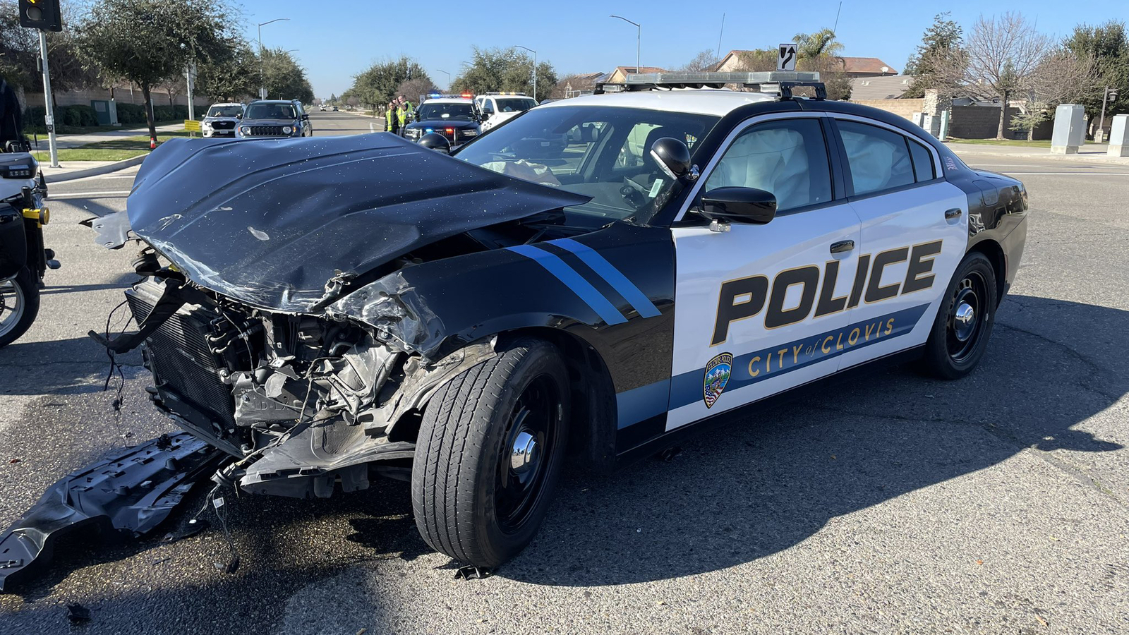 Clovis police officer hospitalized following crash in patrol unit
