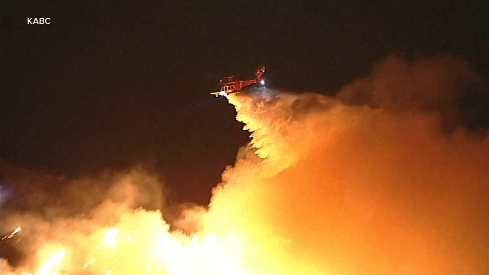 Firefighters battle to maintain upper hand on huge fire north of Los Angeles