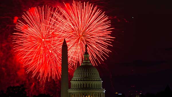 Fireworks illuminate the sky over the U.S. Capitol building and the Washington Monument during Fourth of July celebrations, on July 4, 2014, in Washington.