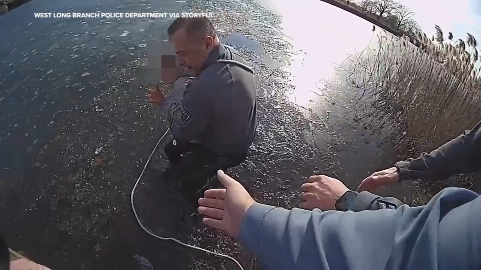 Police officer rescues boy from icy lake in New Jersey, video shows