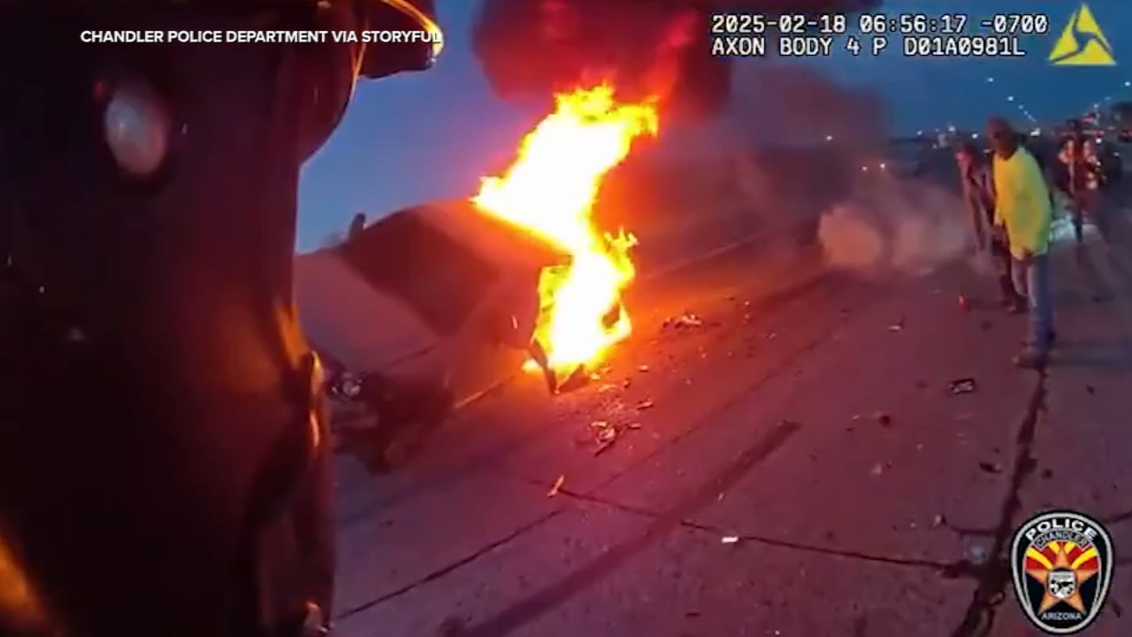 Dramatic video shows officer, offduty firefighter rescue woman trapped