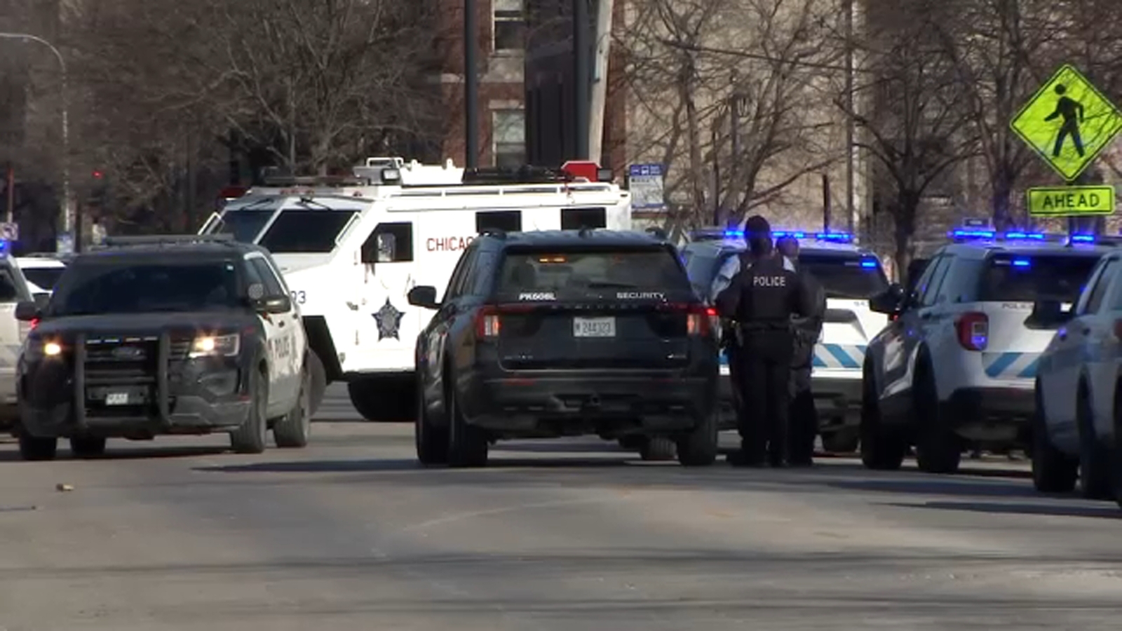 Chicago shooting: Man arrested after shots fired from security guard's ...