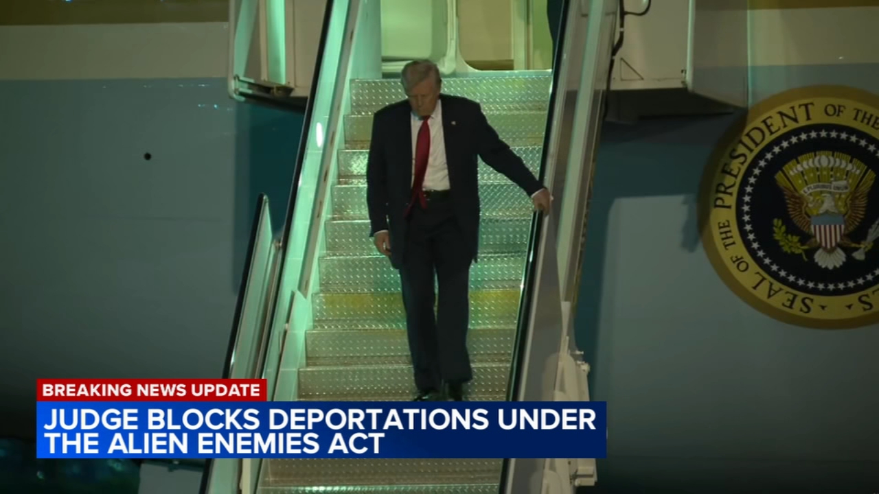 Trump invokes Alien Enemies Act for deportations, stalled by judge