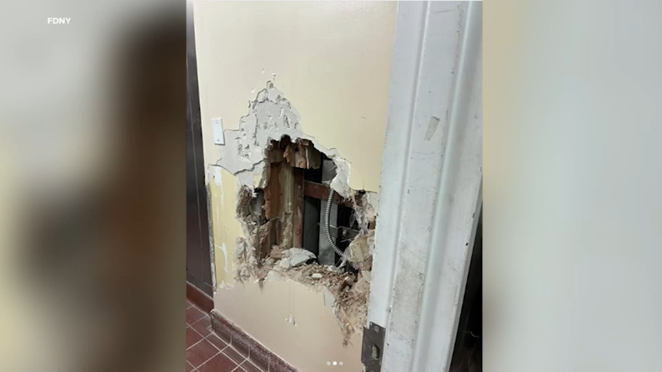 FDNY rescues worker after dumbwaiter falls on him
