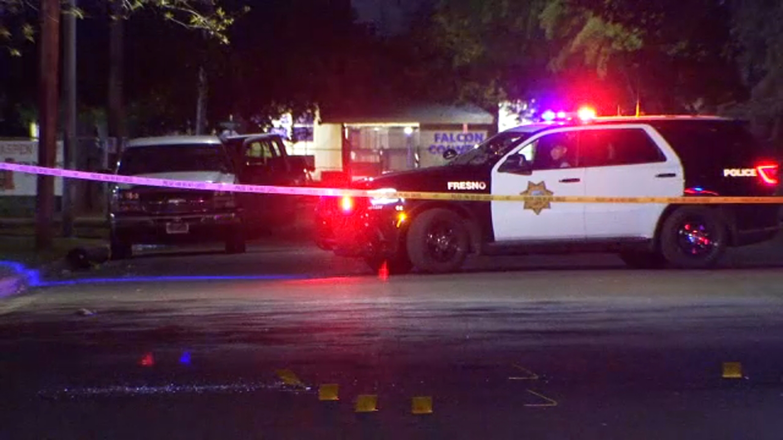 Man and woman shot while sitting in car in Fresno, suspect at large, police say