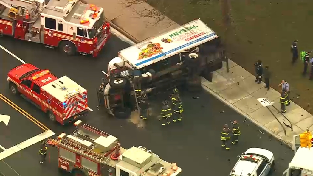 Ambulance and box truck collide injuring 3 people in Morris Park, Bronx - ABC7 New York