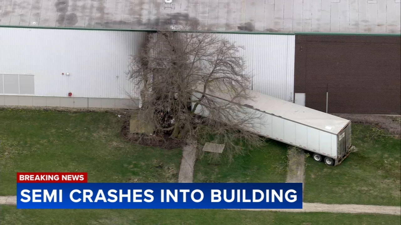 Semi crashes into building in West Chicago: police