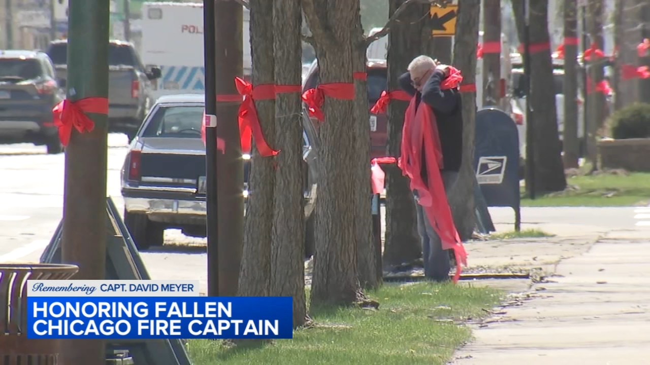 Community ties red ribbons for fallen CFD captain ahead of funeral