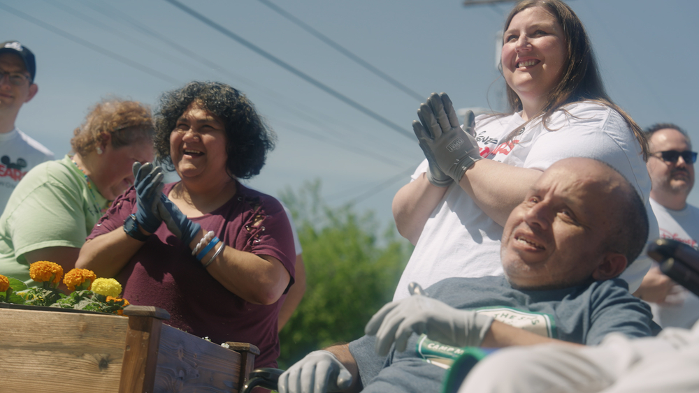 VoluntEARS help build new flower beds for students with special needs