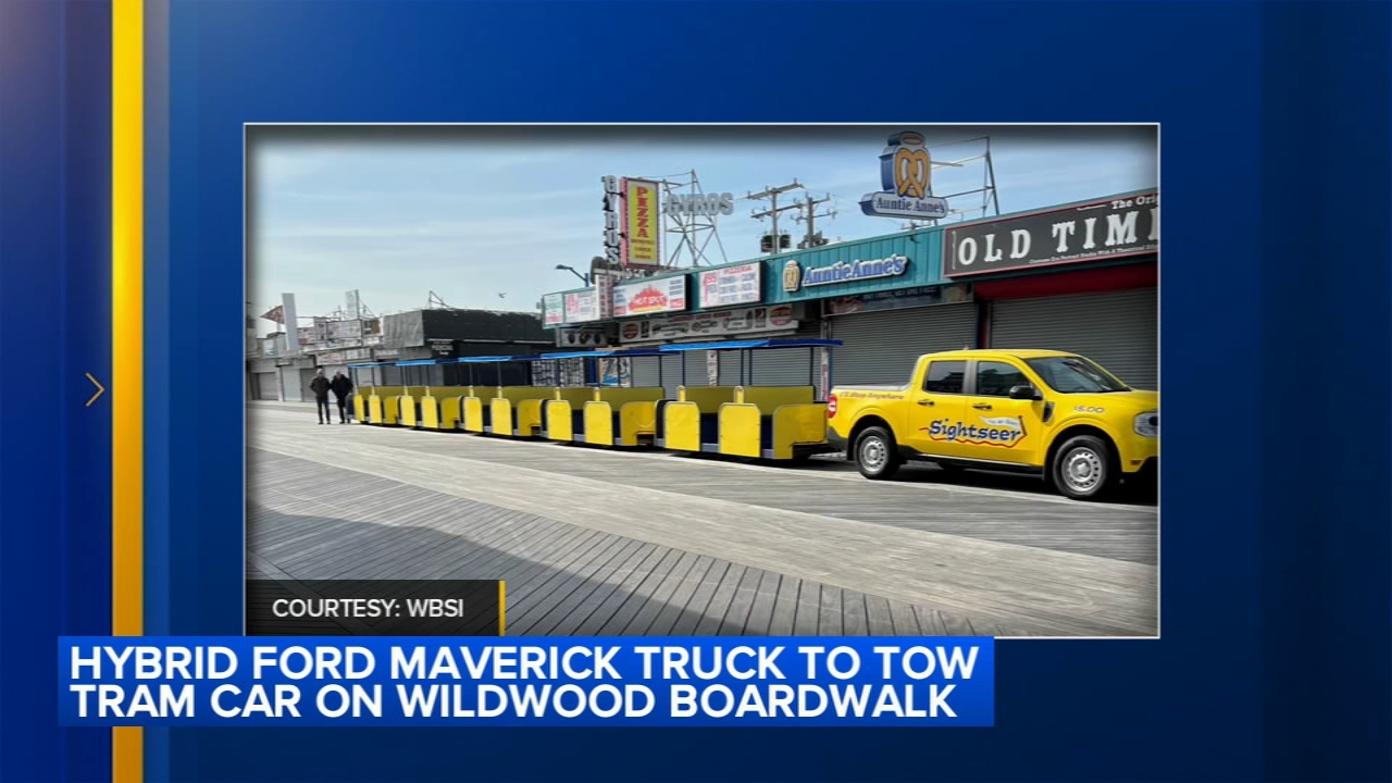A hybrid Ford Maverick truck hits the Wildwood Boardwalk, towing the iconic tram car