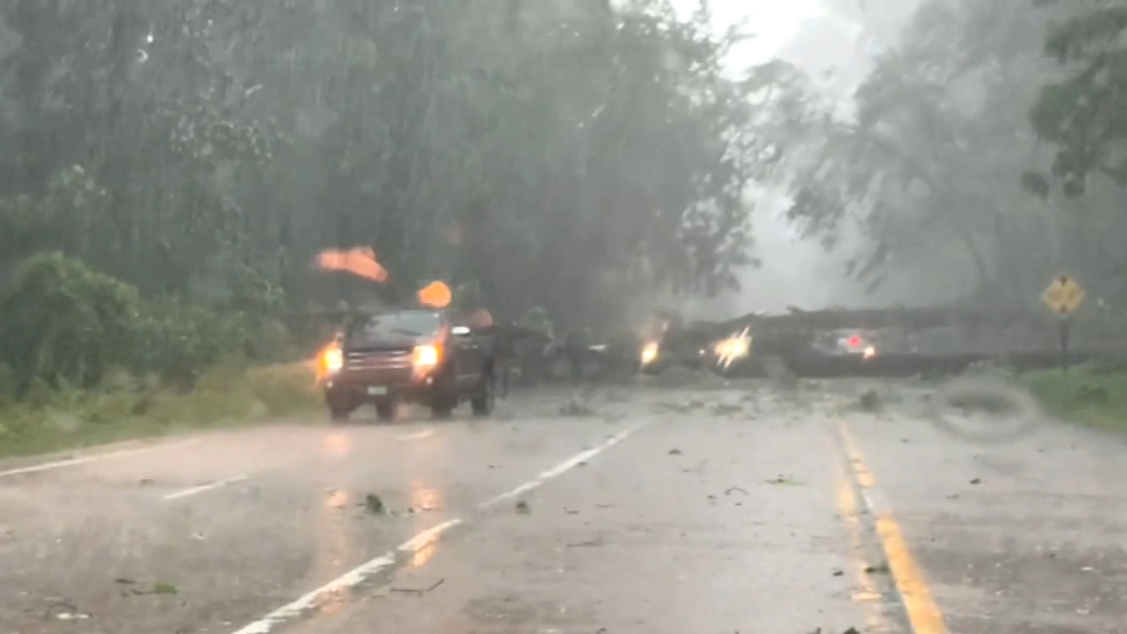 At least a dozen people dead across several states as storms take hold of America's Heartland