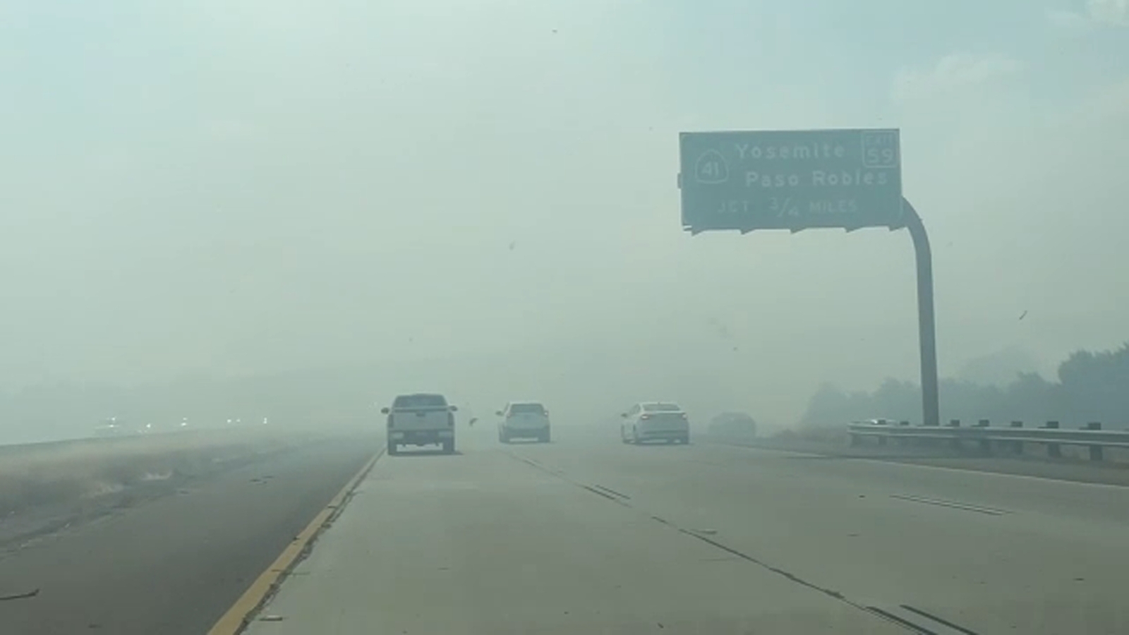 Grass fire near Highway 168 interchange impacts drivers visibility